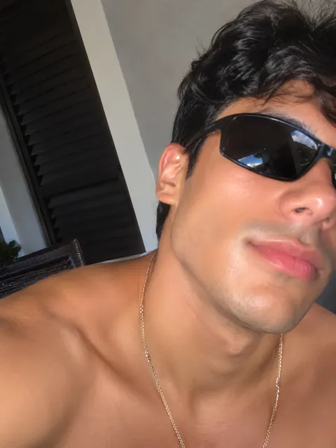 A fictional selfie with sunglasses and a beauty filter